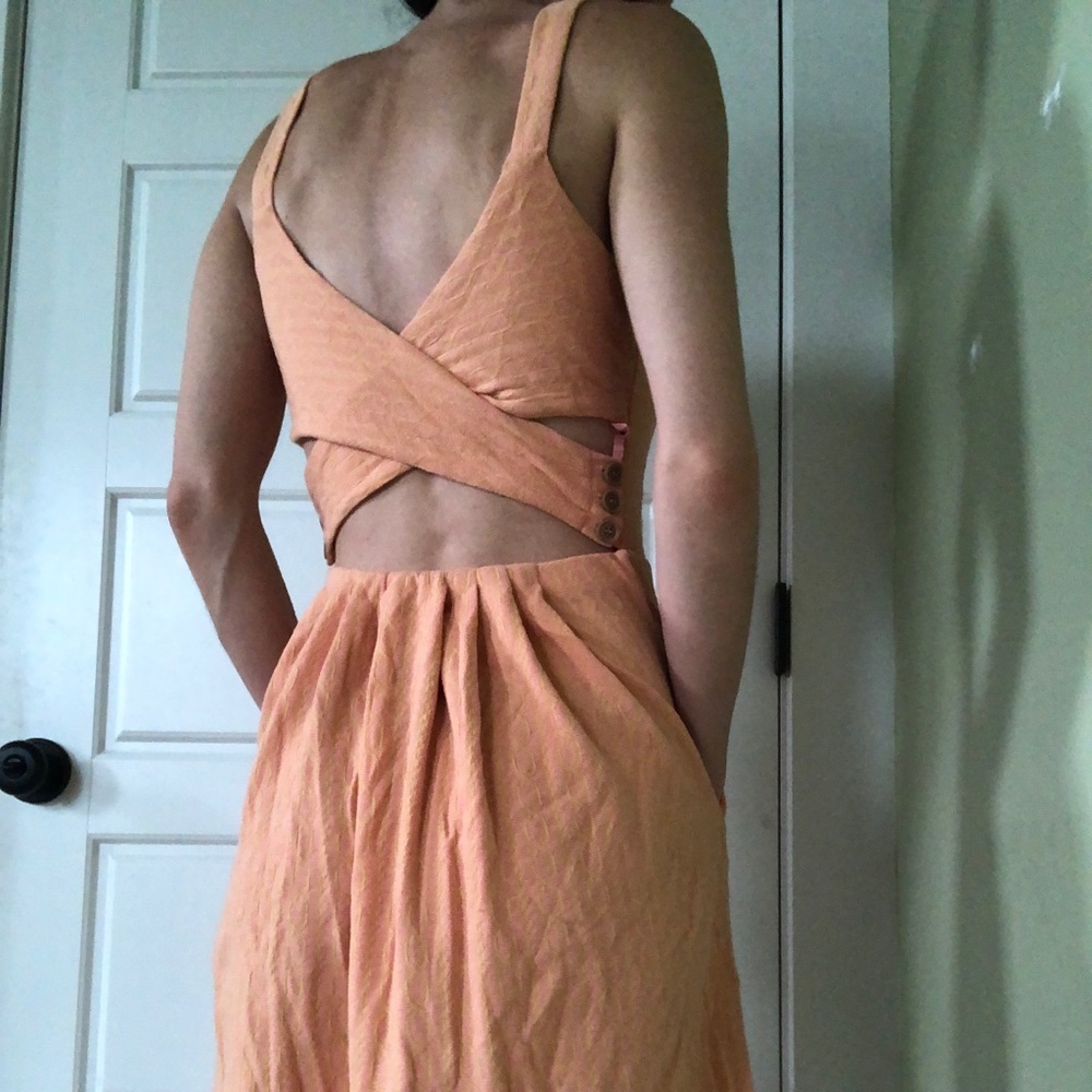 Open back dress with pockets
